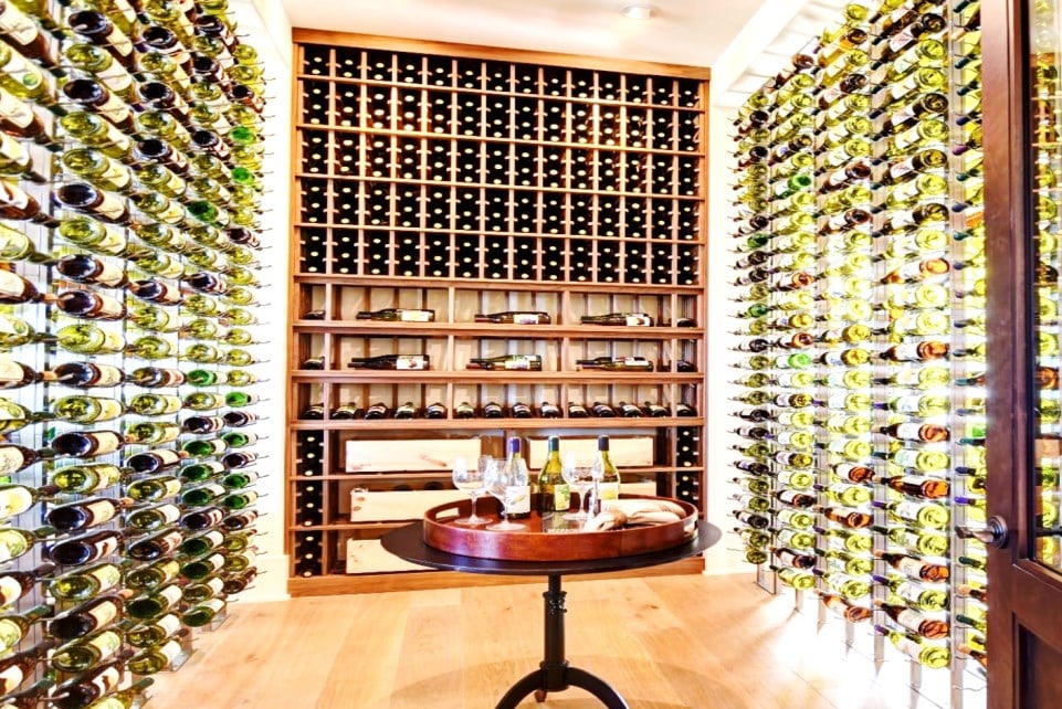 Luxurious Glass Wine Cellar Design with Wood and Metal Wine Racks