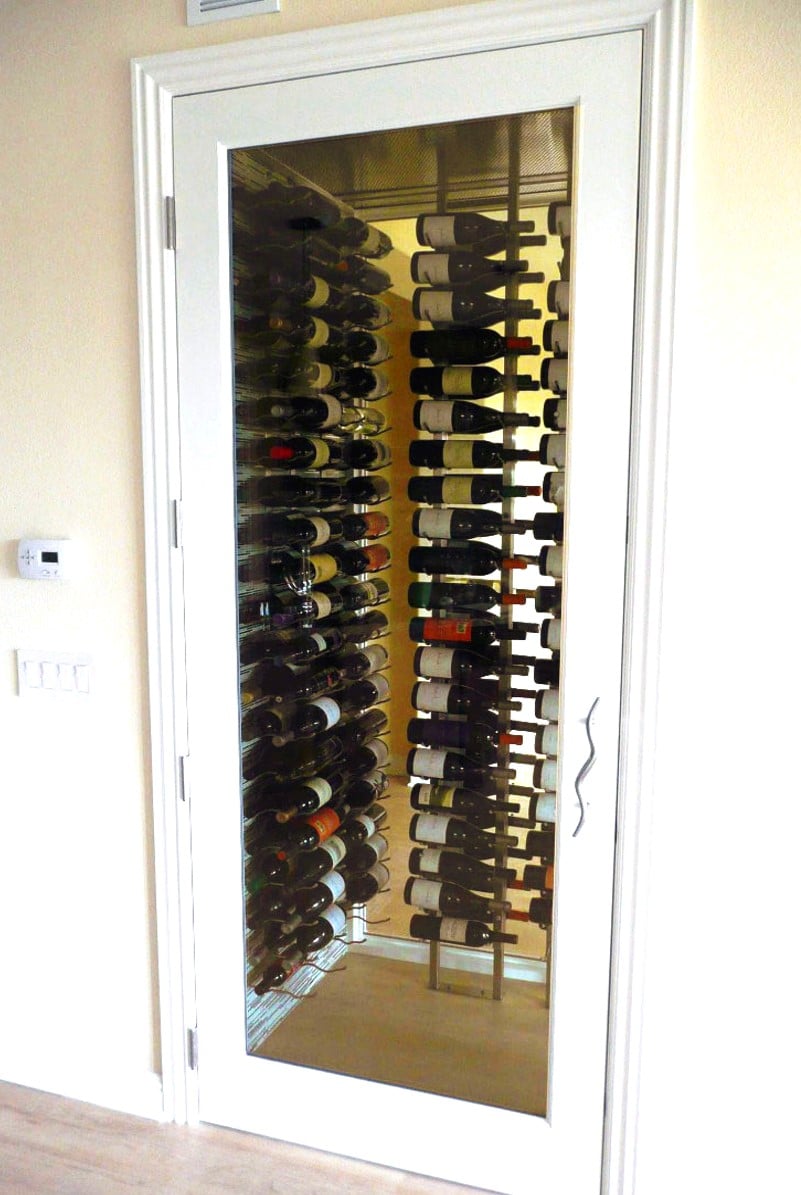 Glass Wine Cellar Doors Allow Wine Displays to Be Enjoyed from the Outside