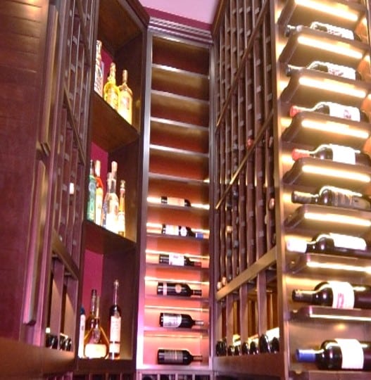 Wooden Wine Racks are Widely Used for Creating Traditional Custom Wine Room Designs 