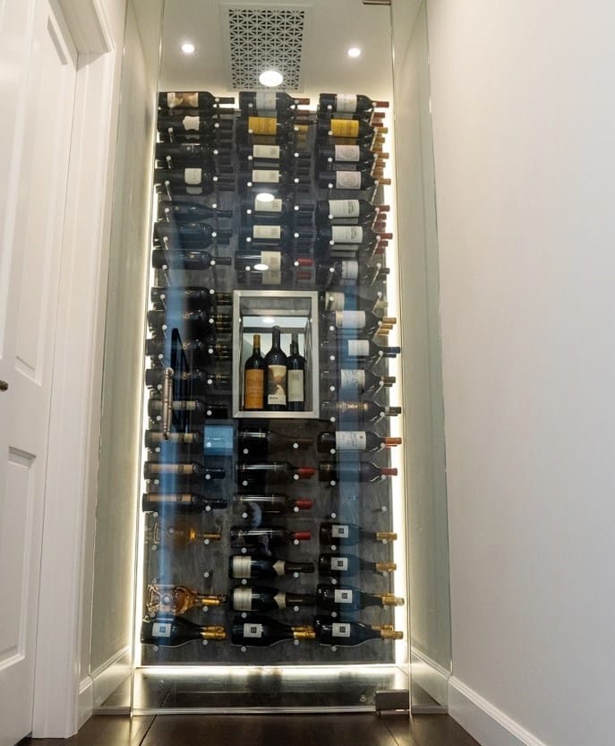 This Small Wine Cellar with Modern Wine Racks is Located at the End of a Hallway