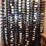 A custom arch in this wine cellar matches the style and decor of this gorgeous Phoenix home.