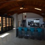 This beautiful kitchen wine closet is a stunning addition to this modern Phoenix home.