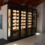 Custom Wine Cellars Scottsdale has a team of experts that can create stunning modern wine storage spaces like this one.