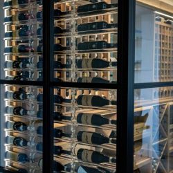 5 - Modern Wine Racks in a Glass-enclosed Cellar Modern Wine Racks in a Glass-enclosed Cellar