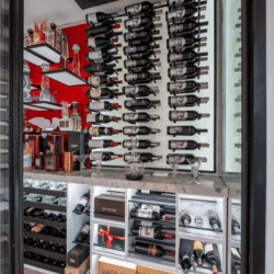 (2) Black metal–framed glass doors facilitate a grand view of the display.