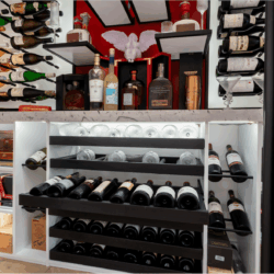 (8) Pull-out drawers were built for both wines and stemware.